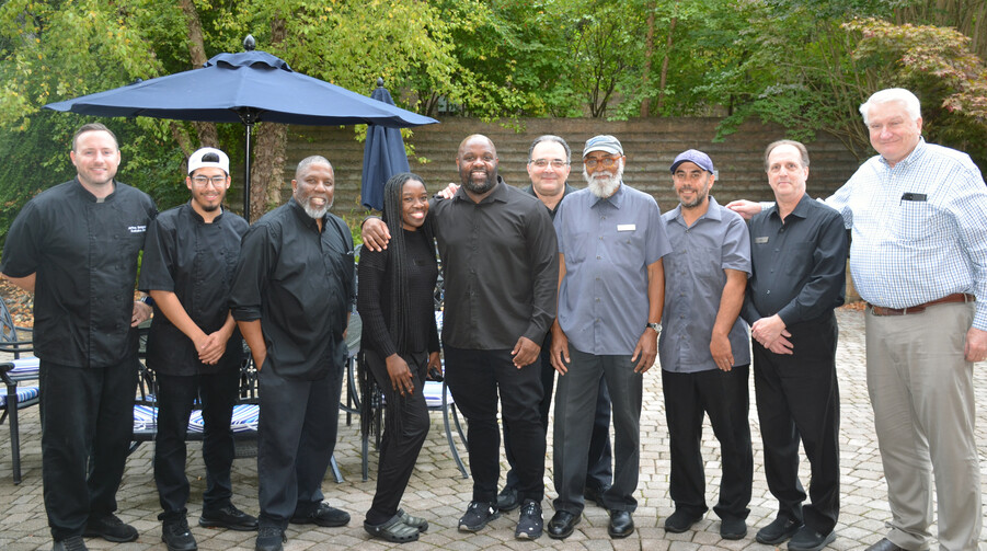 Delaware hotel staff standing on outside patio